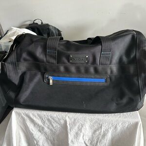 Robert Graham duffel bag black with blue trim cloth
